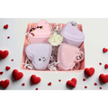 Lavender heart shower steamers gift set with pink and lavender heart-shaped bath bombs and dried flower accents in a pink box