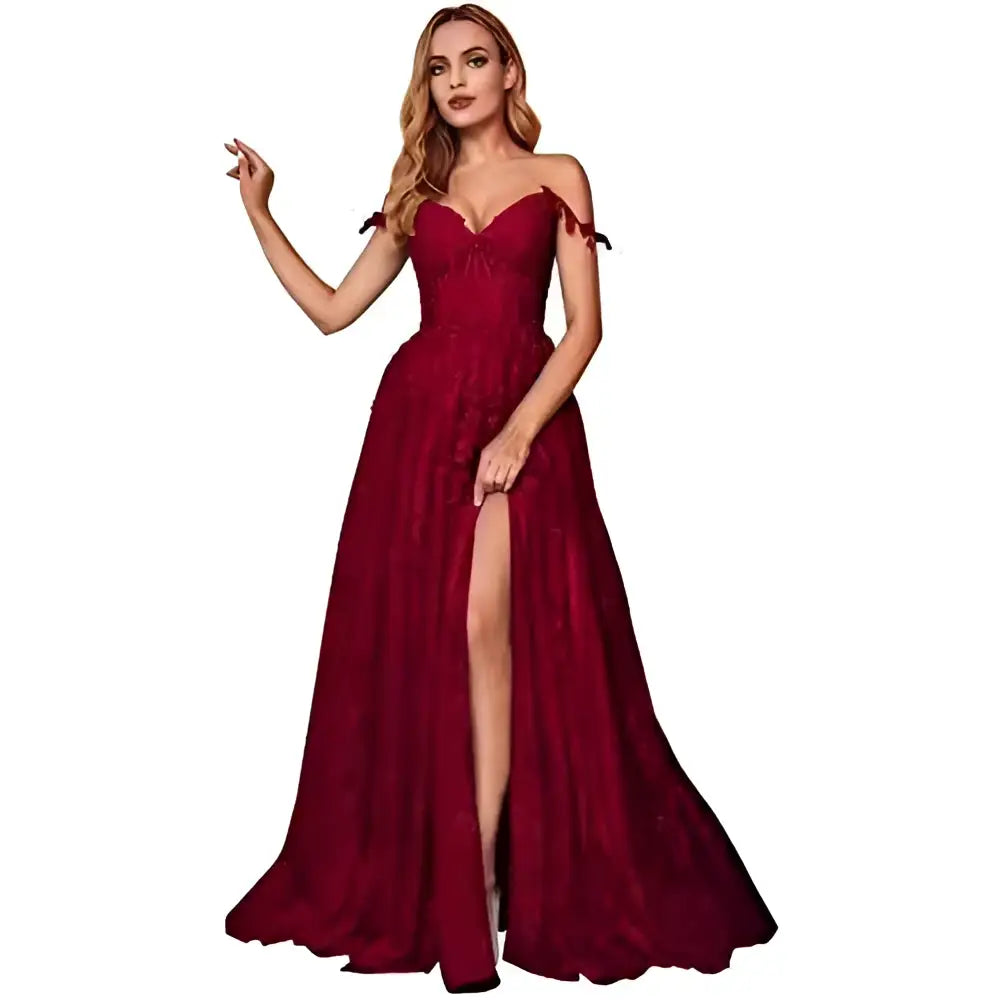 A deep red off the shoulder prom dress with lavender lace detailing and a high slit for red carpet runway events