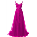 A vibrant fuchsia long prom dress with a sweetheart neckline, delicate lace detailing along the bodice and skirt, and thin spaghetti straps tied at the shoulders.