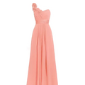 A flowing coral-colored chiffon sleeveless maxi dress with a slanted neck and embellished floral detail at the shoulder