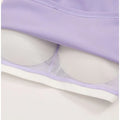 Lavender ribbed running sports bra with breathable mesh cups and white trim designed for quick dry comfort