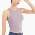 Lavender ribbed sleeveless fitness vest with chest pad featuring a round neckline and crossed panel design crop top