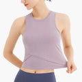 Lavender ribbed sleeveless fitness vest with chest pad featuring a round neckline and crossed fabric front detail
