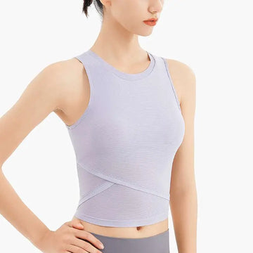 A light lavender ribbed sleeveless fitness vest with chest pad featuring a form-fitting crossed panel design