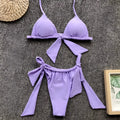 Lavender ruched triangle split bikini swimsuit with tied bow details on top and bottom pieces for stylish swimwear