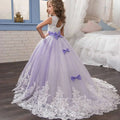 Lavender tulle lace wedding dress for children featuring white lace detailing and matching bows in lavender tulle lace fabric