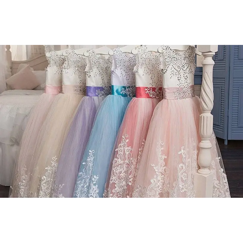 A row of sleeveless lavender tulle lace wedding dress and pastel light blue clothing with white lace detailing