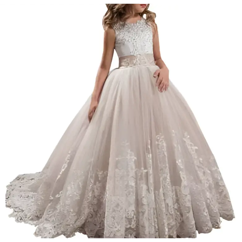 A woman wears an elegant sleeveless lace wedding dress in champagne with lavender tulle lace detailing