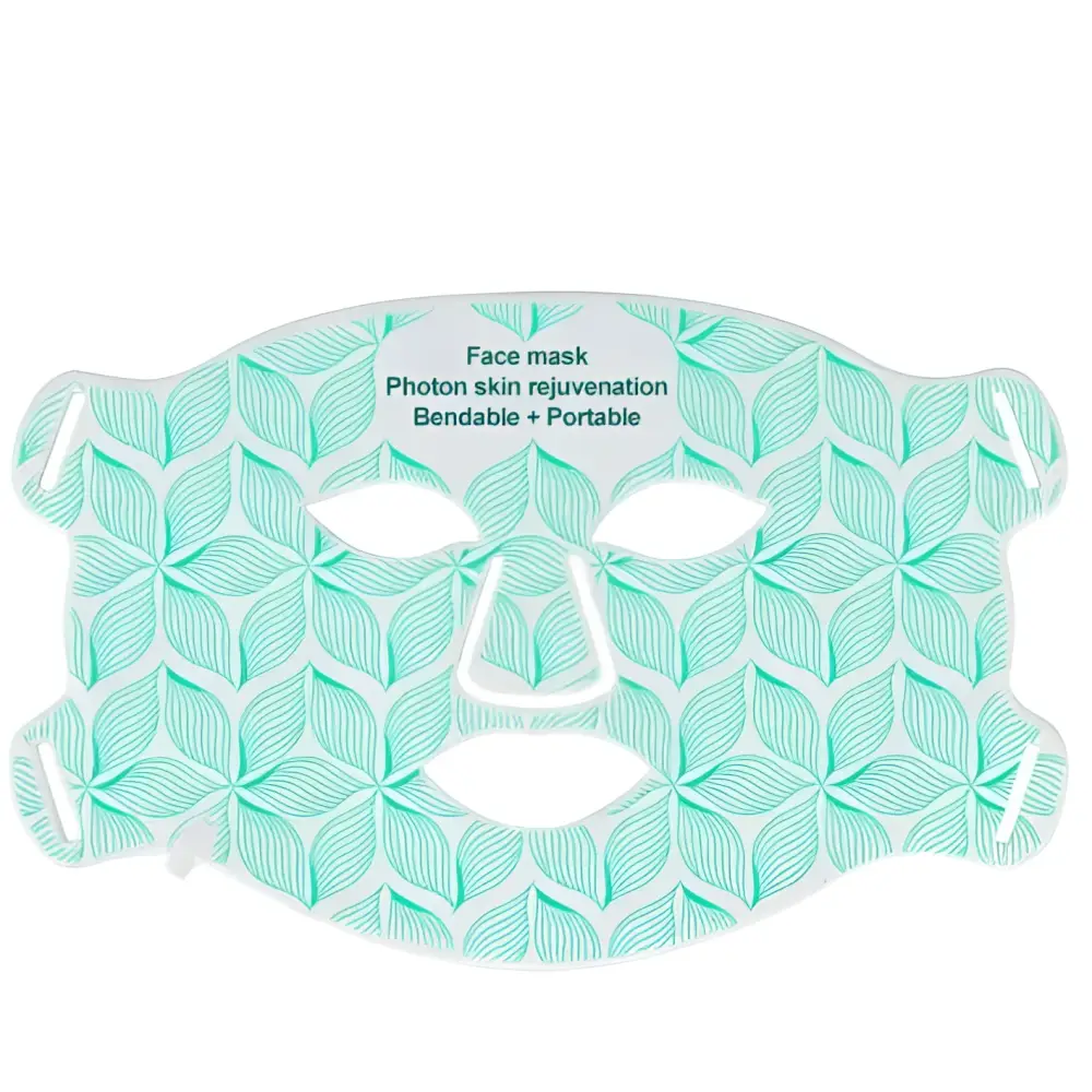 A mint green leaf pattern led skin rejuvenation beauty apparatus face mask with cutouts for eyes nose and mouth