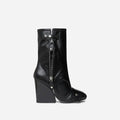 Black leather wedge high heel short tube boots with chunky heel and zipper closure for stylish wear