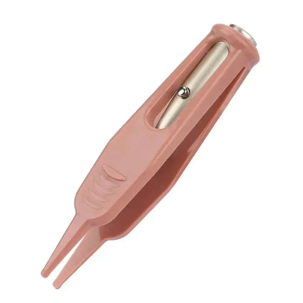 Led baby tweezers in pink plastic with metallic mechanism and textured grip for precise baby nose cleaning