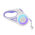 White and purple led dog leash retractable with ergonomic handle and metallic clasp featuring traction rope design