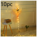 Luminous balloon rose bouquet featuring a single yellow rose inside a transparent bobo ball with warm LED lights