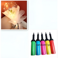 A glowing translucent transparent bobo ball luminous balloon rose bouquet filled with warm lights and wrapped in white tulle