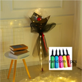 A luminous balloon rose bouquet featuring a single red rose in a transparent bobo ball wrapped with black tulle and lights