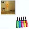 A set of five colorful cylindrical hand pumps with black nozzles for inflating luminous balloon rose bouquet transparent bobo ball