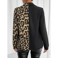 A stylish printed belted shirt with a black and bold leopard print sequined blazer design