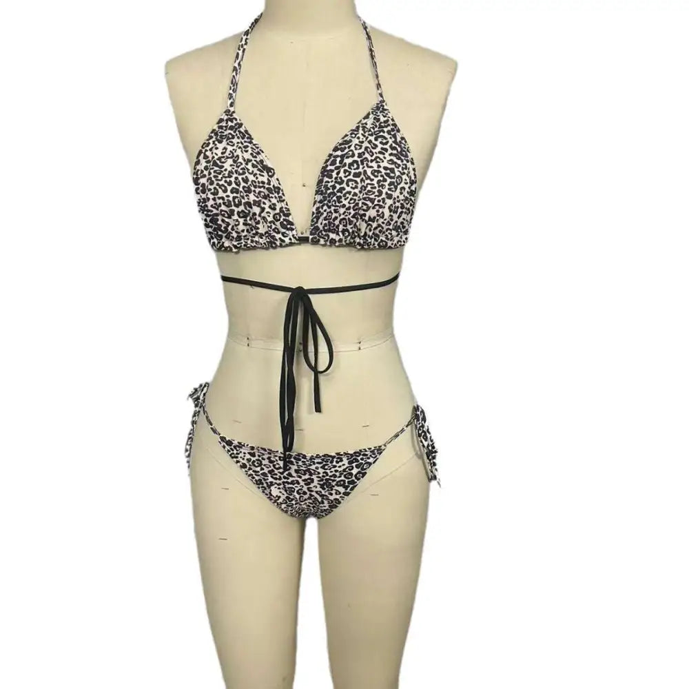 Black and white leopard print breathable strap bikini swimsuit with halter top and side-tie bottoms for summer beachwear