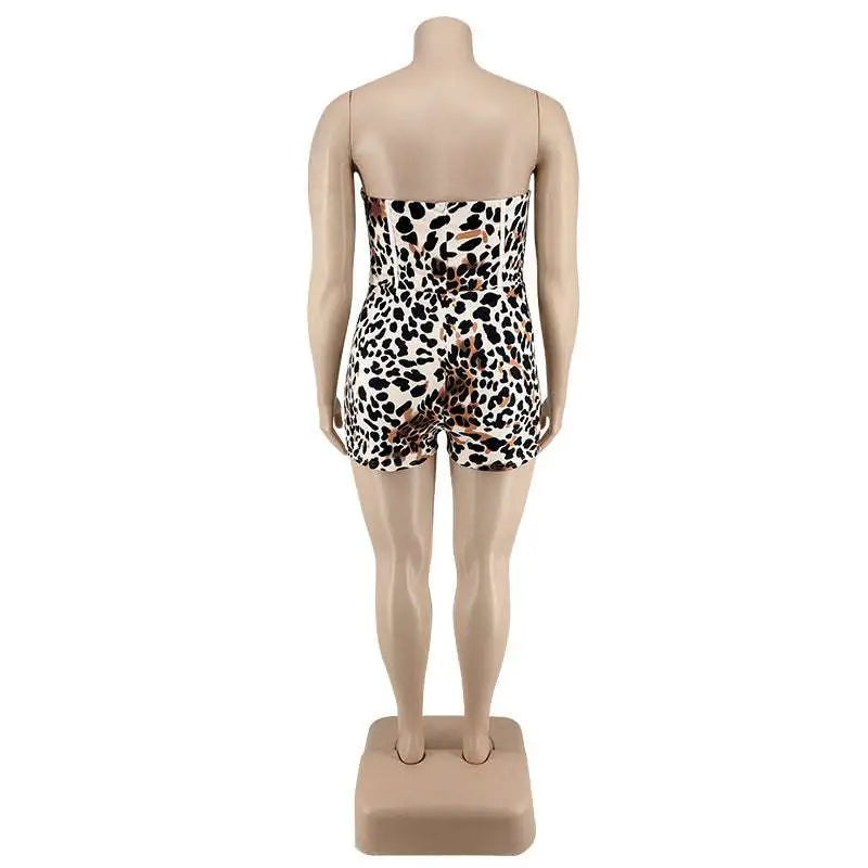 Strapless leopard print jumpsuit plus size with fitted corset waist and short legs on a white base made from stretchy fabric
