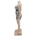 Strapless leopard print jumpsuit plus size with a black and white base and form-fitting mini dress style