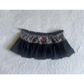 Black leopard print sexy hot girl skirt with ruffled velvet hem and delicate lace trim for stylish wear