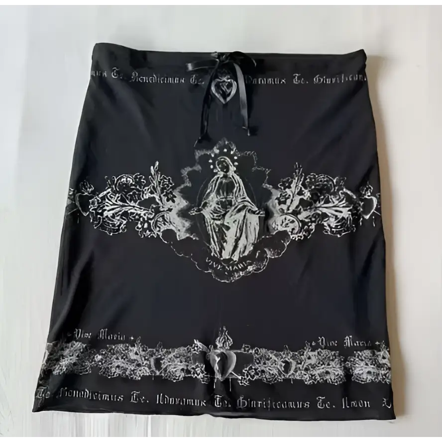 Black skirt with lace trim embroidery and central religious figure design featuring a drawstring waistband for a hot girl skirt