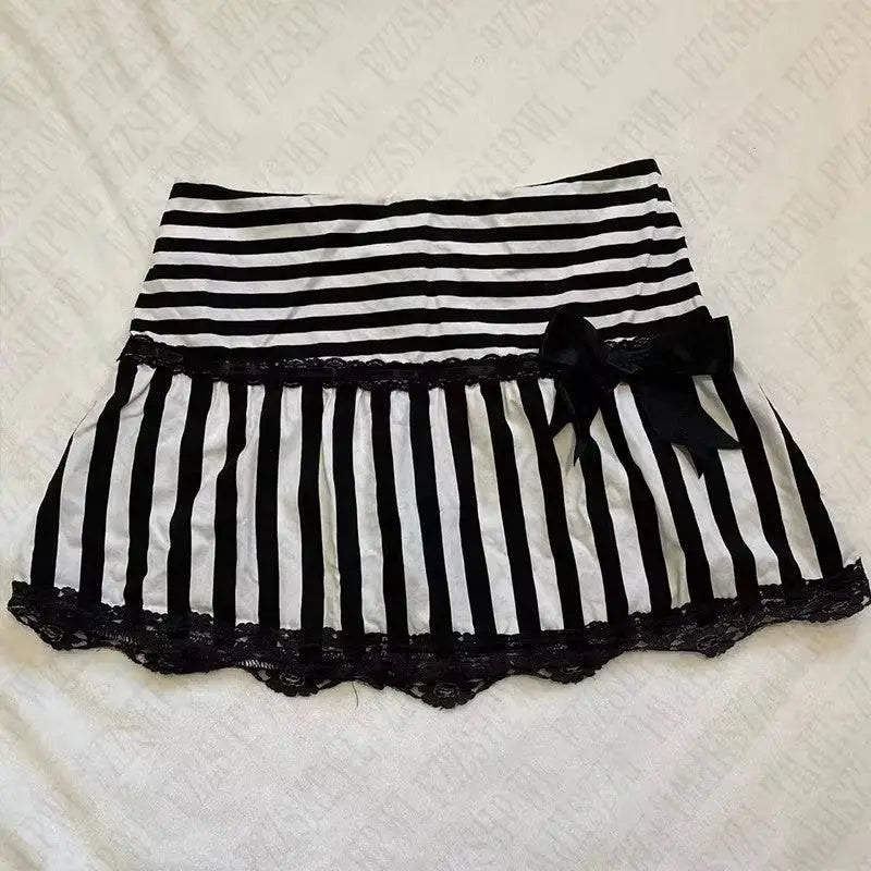 Black and white striped hot girl skirt with lace trim and black bow accent for a leopard print sexy look