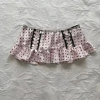 A pink polka-dot mini hot girl skirt with black lace trim lacing and ruffled hem leopard print sexy style