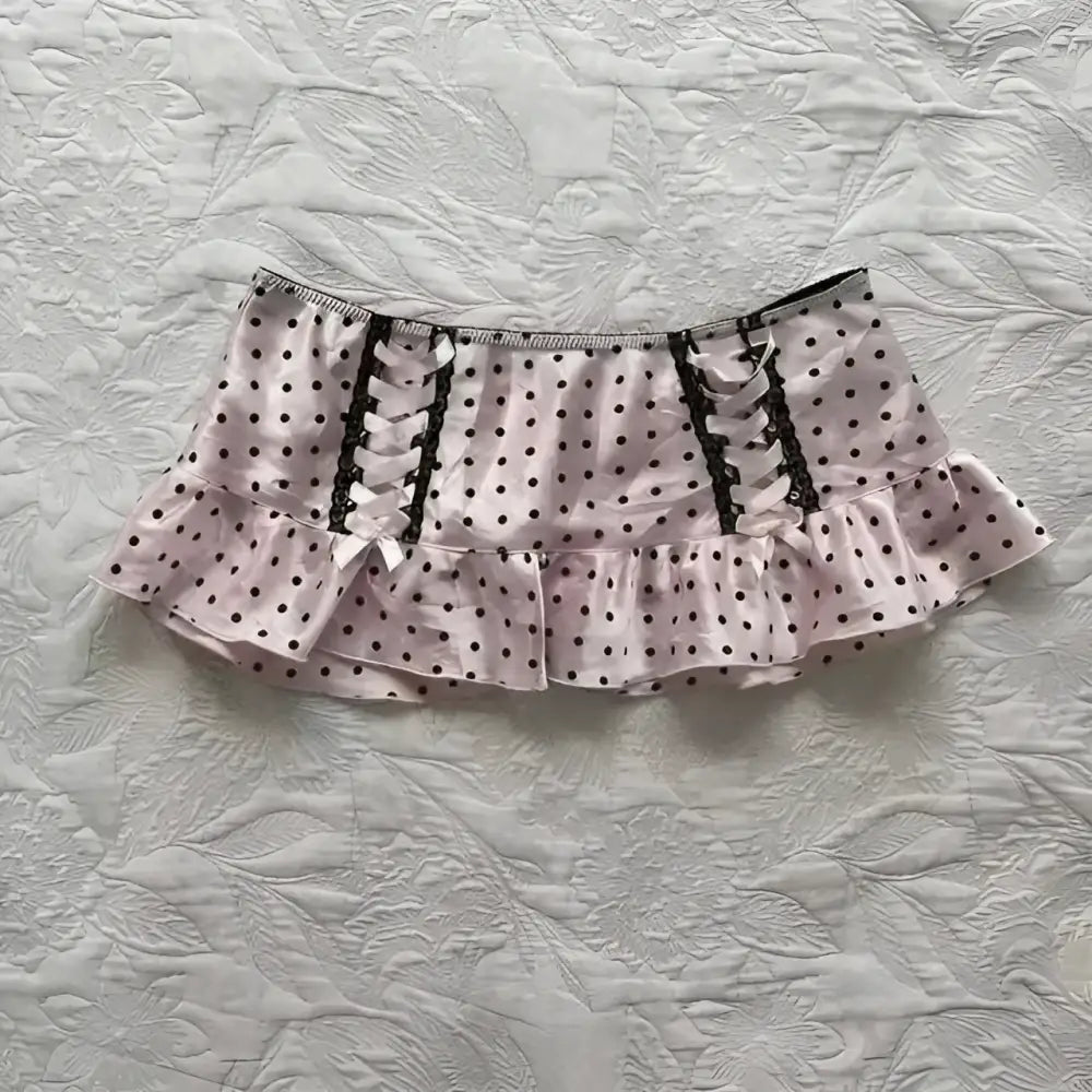 A pink polka-dot mini hot girl skirt with black lace trim lacing and ruffled hem leopard print sexy style