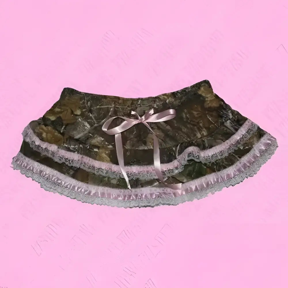 Leopard print sexy hot girl skirt featuring camouflage pattern, lace trim, and satin bow at the waist