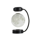 Levitating led moon night light with magnetic base features a translucent textured lunar surface and wireless levitation
