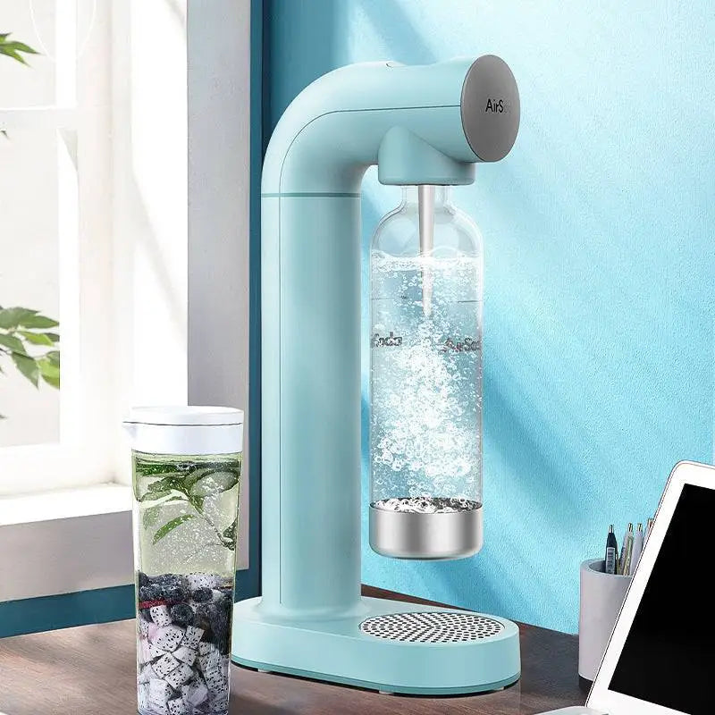 Light blue bubble water machine with clear glass bottle and silver base for making bubble water at home