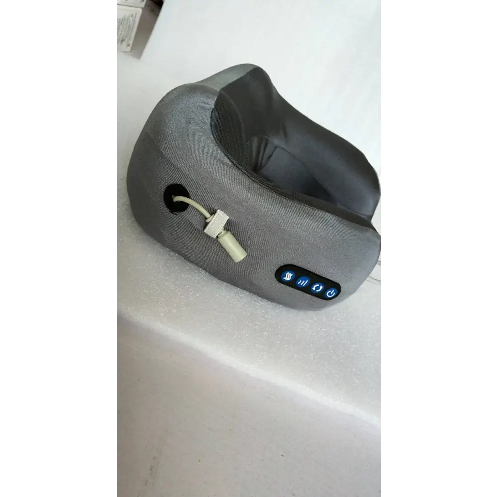 Light blue fabric car massage pillow neck massager with sleek contoured design and three illuminated control buttons