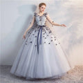 Light blue tulle ball gown with black silver floral appliqués and navy satin ribbon for vocal choral art exam performances