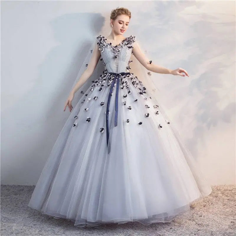 Light blue tulle ball gown with black silver floral appliqués and navy satin ribbon for vocal choral art exam performances