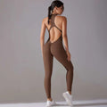 A sleek solid brown slim bodysuit with a high neckline and open back designed for jumpsuit yoga fitness and long pants jumpsuit use