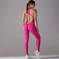 A vibrant fuchsia slim bodysuit with a high neck and cut-out back design for jumpsuit yoga fitness use