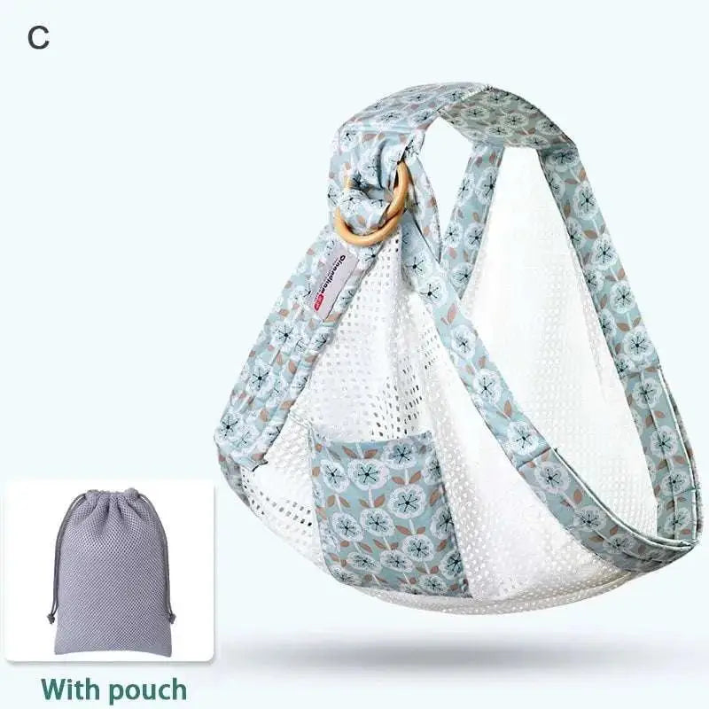 Light blue mesh newborn sling with wooden ring nursing cover featuring floral fabric and a gray drawstring pouch
