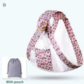 Pink floral-patterned baby carrier with wooden ring and white mesh panels for newborn sling and nursing cover use