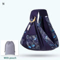 Navy blue newborn sling with whimsical ocean pattern and wooden ring mesh nursing cover for infants