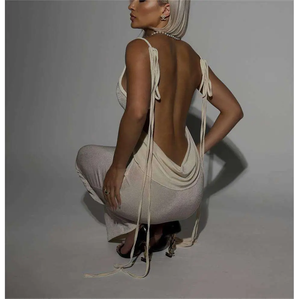 Off-white satin slim backless dress with plunging back and tie straps perfect as a dress summer gown