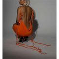Back view of a vibrant orange slim backless dress summer gown with thin straps tied in decorative knots along the spine