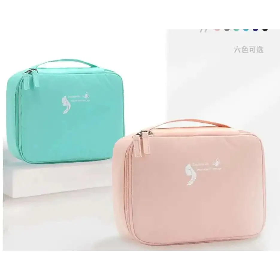 Pastel pink and teal soft fabric square travel storage bag with subtle white logo for light blue multifunctional use
