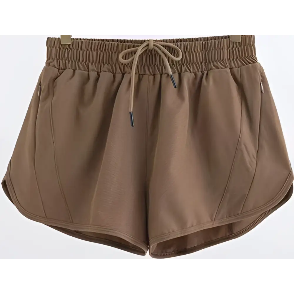 Brown summer sports shorts with elastic waistband and matching drawstring designed with zipper pockets breathable fabric