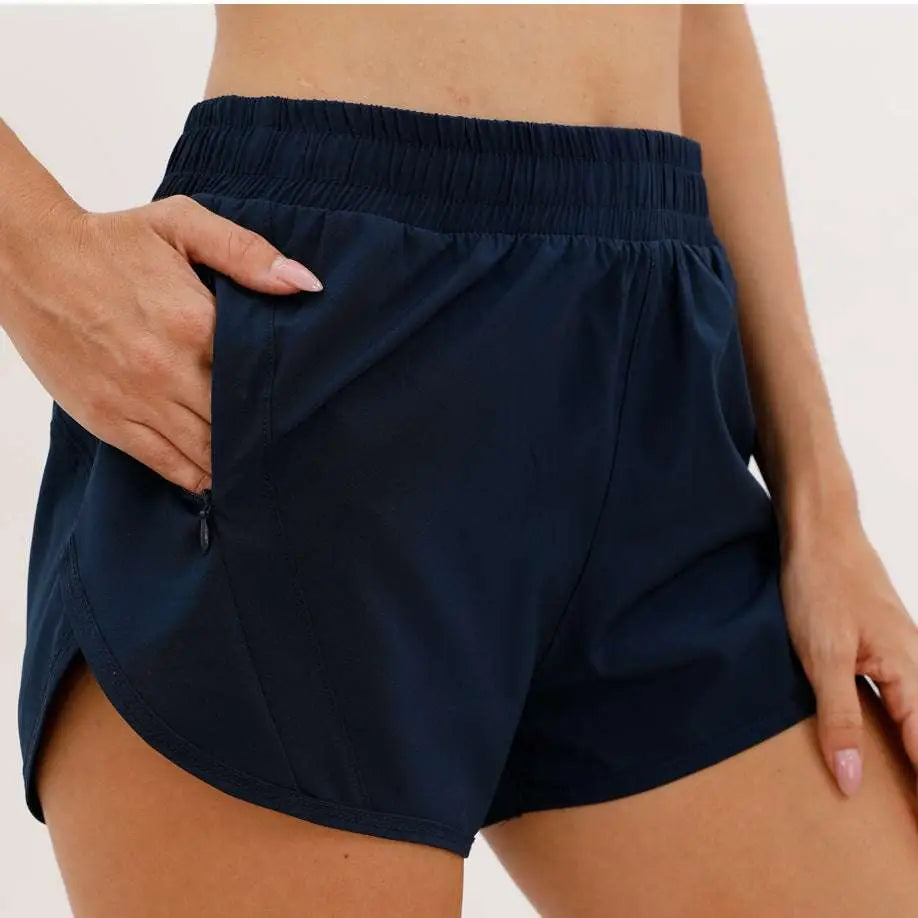 Navy blue summer sports shorts with zipper pockets and elastic waistband designed for breathable comfort