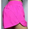 Bright pink summer sports shorts with breathable fabric elastic waistband and small zipper pockets on the side