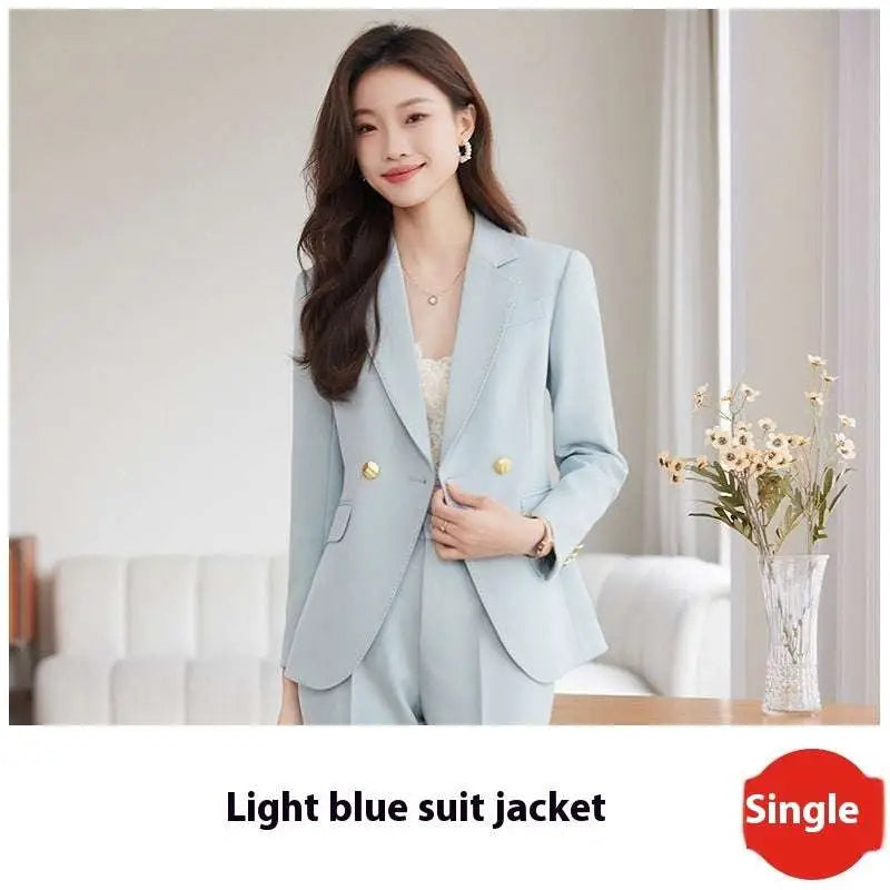 Light blue tailored business suit jacket with gold buttons featuring a slim fit for formal occasions