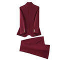 A tailored business suit featuring a sleek wine red blazer and trousers with gold buttons for a polished look