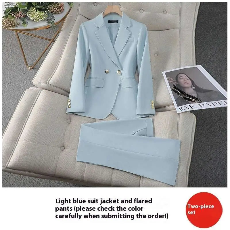 Light blue tailored business suit with gold buttons featuring a blazer and matching flared pants for formal wear