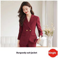 Light blue tailored business suit with gold buttons paired with a wine red blazer featuring gold buttons